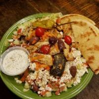 Greek Salad · Lettuce, tomato, cucumber, onions, green pepper, radish, carrot, feta cheese, black olives, ...
