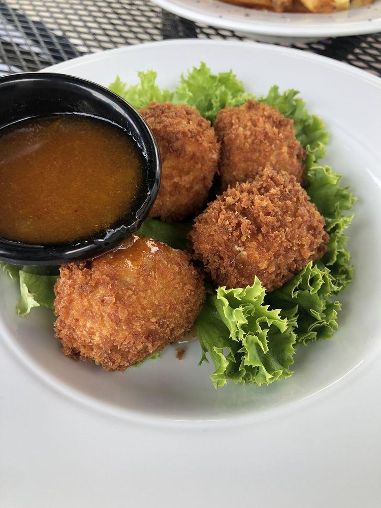 Fried Feta · Creamy feta breaded in panko and served with a peppered apricot preserve.