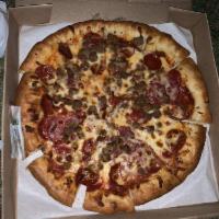 Meat Lovers Pizza · Pepperoni, ham, beef, sausage, and diced bacon.