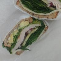 Green Giant Sandwich · Sliced turkey breast, avocado, pesto mayo, lettuce, onions, cucumber and fresh spinach and p...