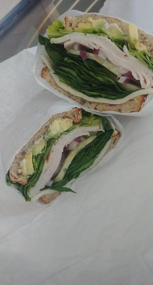 Green Giant Sandwich · Sliced turkey breast, avocado, pesto mayo, lettuce, onions, cucumber and fresh spinach and provolone on toasted multigrain.