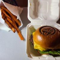 Ori Emo Burger · 5 oz Beef, American cheese, lettuce, tomatoes and emoji aioli. Cooked medium well. On a Fres...