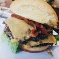 Double Whammy Burger · 2- 5oz ounces beef patties, Applewood Bacon, cheddar cheese, lettuce, tomatoes and emoji aio...