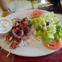 Chicken Kabob Plate · 2 skewers of marinated grilled chicken served with couscous or rice, Greek salad or tabboule...