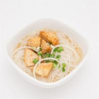 Tofu Pho · Tofu Pho comes with beansprout, scallion, onion, black pepper, lime, Thai basil, and Srirach...