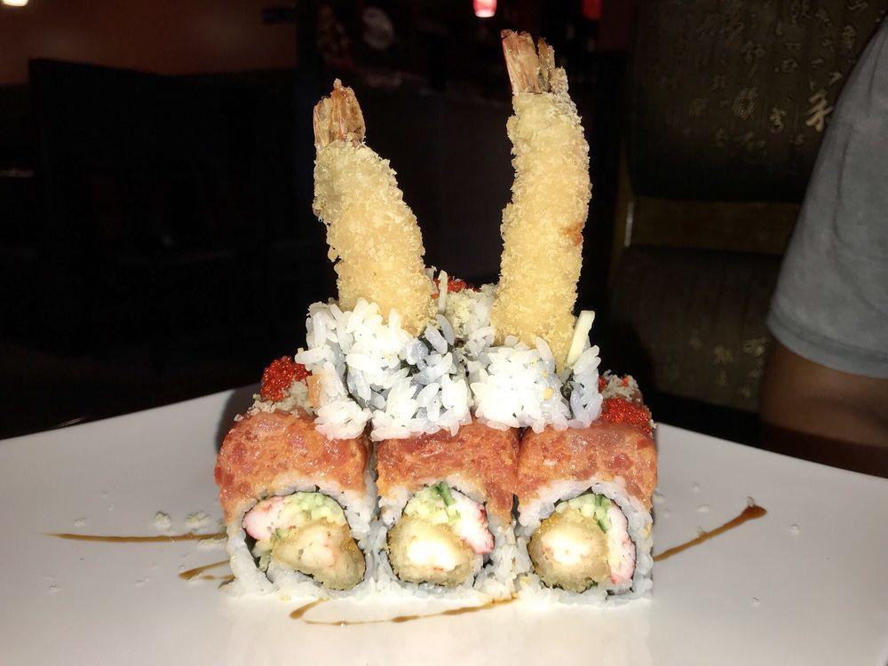 Red Lion Maki Roll · Shrimp tempura topped with spicy tuna. Hot and spicy.