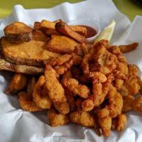 Clam Strips · Atlantic surf clams, tender, breaded and deep fried served with cart-made cocktail sauce.