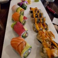 8 Pieces Rainbow Roll · Tuna, white fish, fresh salmon and avocado on a California roll.
