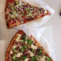 Tasty Pizza · Olive oil, fresh broccoli, red onion, ricotta cheese, light sprinkled garlic and crispy bacon.