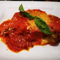 Lasagna · Classic Bolognese sauce and creamy bechamel.