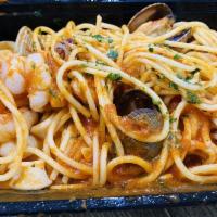 Seafood Spaghetti · Shrimp, clams, calamari and light spicy tomato sauce.