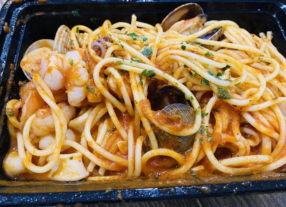 Seafood Spaghetti · Shrimp, clams, calamari and light spicy tomato sauce.