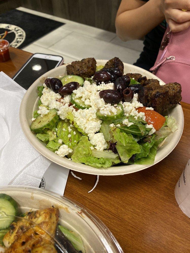 Greek Salad · Romaine Lettuce , Tomato , cucumber , Feta Cheese , Greek Olives and House Dressing 