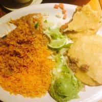 Gorditas · Handmade corn gorditas filled with chicken, beef or brisket, served with pico de gallo and g...