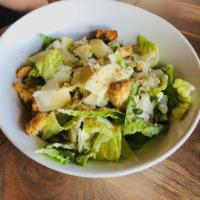 Caesar Salad · Torn croutons, Parmigiano-Reggiano & house-made Caesar dressing.