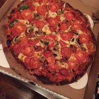 Bada Bing Pizza · Includes: prosciutto, bacon, pepperoni, mozzarella, Roma tomato, spinach and mushroom.