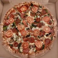 Bada Bing Pizza · Includes: prosciutto, bacon, pepperoni, mozzarella, Roma tomato, spinach and mushroom.