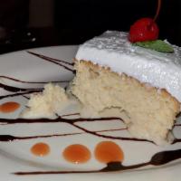 Tres Leches Cake · Sponge cake soaked in a sweet mixture of 3 different types of milk.