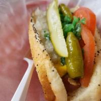 Chicago Dog · The Windy city meal on a bun beef hot dog, mustard, onion, relish, tomato, pickle, sport pep...