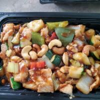 Cashew Chicken · White meat chicken sauteed with zucchini, onion, bell pepper and celery mushroom in a mildly...