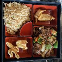 Pepper Beef Classic Bento Box · 2 pieces of pot stickers, 2 pieces of cream cheese wontons and lo mein noodles.