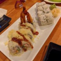 Tootsie Roll · 8 pieces. Shrimp tempura, crab meat and cucumber inside. Wrapped with tempura flakes and ser...