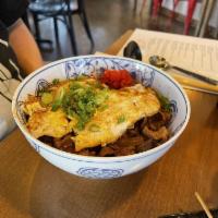 Gyudon Beef Donburi · Beef rice bowl marinated with sweet soy sauce and sesame oil cooked egg, onion and green oni...
