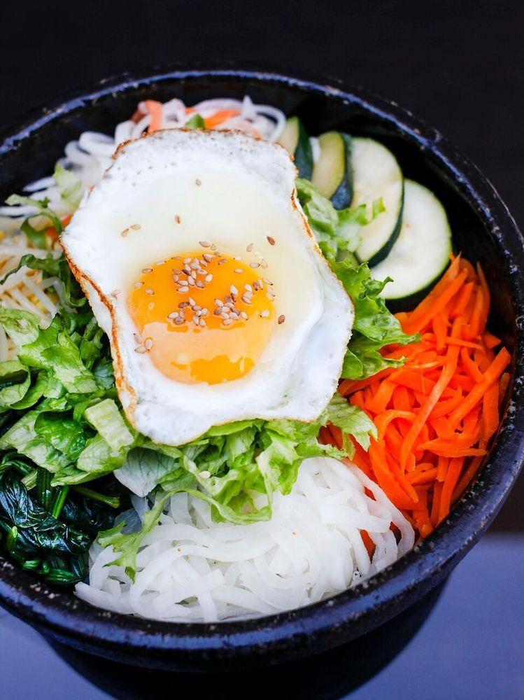 Bibim Bop · Bulgogi beef , shrimp, chicken or tofu with rice, vegetables and egg, 4 small sides and hot and sweet chili pepper paste on the side