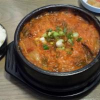 Kimchi Chigae Soup · Kimchi and tofu pork stew. Hot and spicy. 