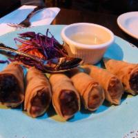 Crispy Rolls · Carrots, onions, celery, glass noodles and cabbage wrapped in rice paper and served with plu...