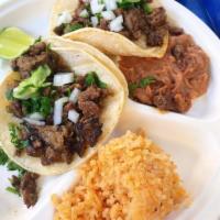 Taco Combo · Any 2 tacos above with side of rice and beans.