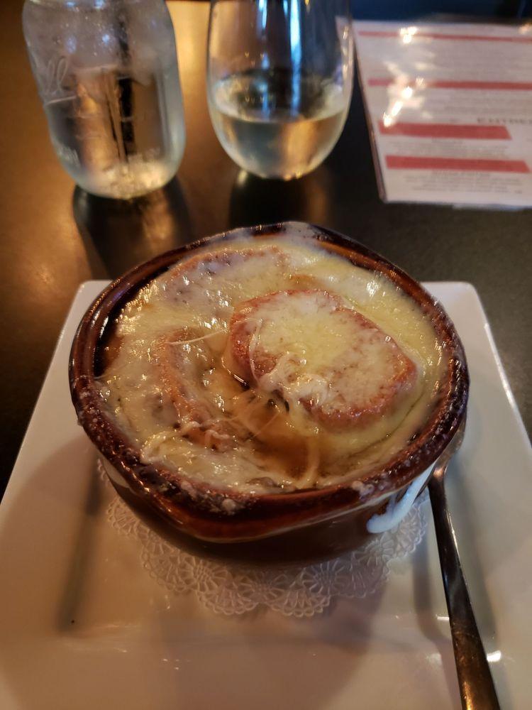 French Onion Soup · House-made topped with Swiss cheese.