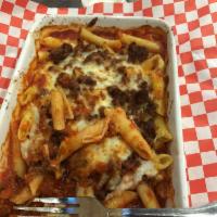 Baked Ziti · Smothered with meaty hearty tomato sauce baked with mozzarella cheese. Served with salad and...