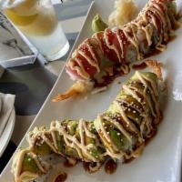 Dragon Roll · Shrimp tempura and cucumber topped with avocado, eel sauce and spicy mayo.