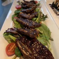Grilled Short Ribs · Marinated in sesame BBQ sauce.