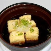 Agedashi Tofu · Deep fried tofu in light broth with scallions and grated radish.