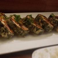 Genki Ya Roll · Tuna, salmon, crab stick, avocado, sweet potato tempura, cream cheese, and flying fish roe. ...