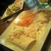 Seafood Chimichangas · 2 flour tortillas, fried or soft filled with shrimp and cran meat drizzled with a cheese sau...