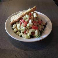 Cucumber Salad · Diced cucumbers, tomatoes, onions, feta and cilantro. Vegetarian.