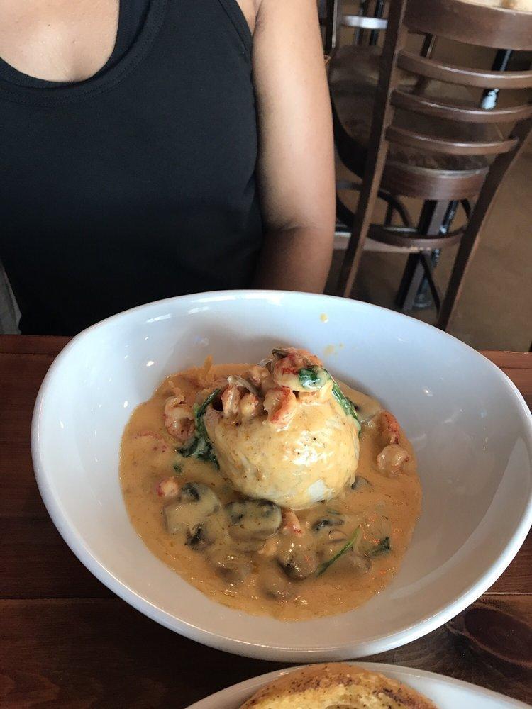 Stuffed Fish · Baked fish stuffed with homemade boudin topped with crawfish, spinach and mushrooms in a lemon cream sauce.