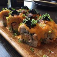 Volcano Roll · Baked salmon, crab meat, and avocado topped with spicy sauce, scallion, and tobiko.