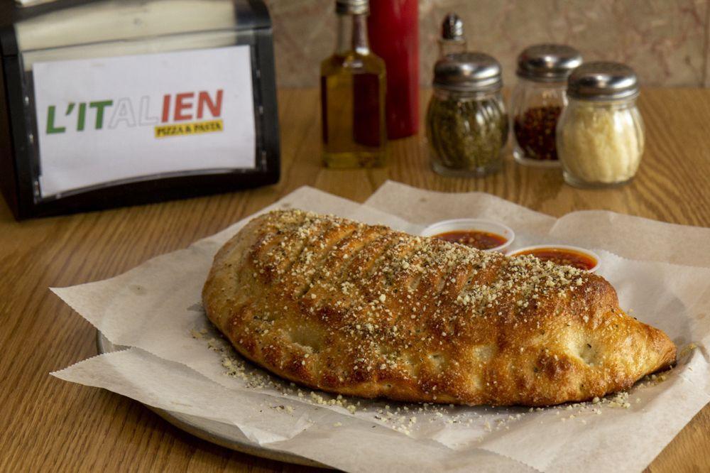 Calzone · Mozzarella cheese, ricotta cheese and any 2 toppings.