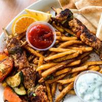 Chicken Kabob · Skewered chicken marinated in olive oil, lemon and ginger then grilled to perfection. Gluten...