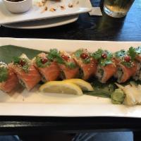 Lemon Cilantro Roll · Crab, cilantro, cucumber, avocado. Topped-salmon, lemon and ponzu sauce.