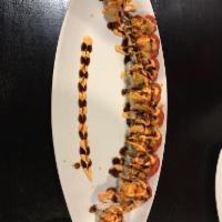 Sexy Roll · Krab, tempura shrimp, cream cheese and avocado, topped with spicy tuna, shrimp tempura crunc...