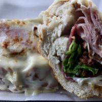 Hot Hero · Virginia ham, salami, provolone served hot on a French roll with lettuce, green pepper, onio...