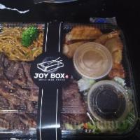 Beef Short Rib Bento Box · Includes beef short ribs, white rice, fresh salad, two pieces of gyoza, one piece of chicken...