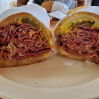 Pastrami Sandwich · Smoked and cured beef sandwich. 