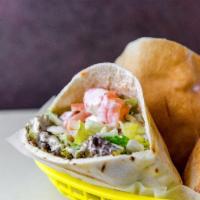 Falafel Sandwich · Finely ground chickpeas, onions, parsley, garlic, and spices, deep-fried; served in a pita p...