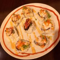 Red Lobster Roll · In: Tempura lobster tail, avocado and cucumber. Top: Snow crab, tobiko and spicy mayo sauce.